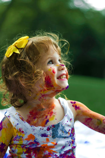 Children playing creatively without screens