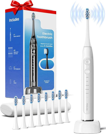 Electric toothbrush set with packaging, toothbrush, and multiple brush heads on a white background