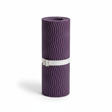 Premium purple non-slip yoga mat rolled up
